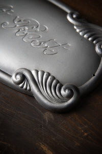 Large 1920s "At Rest" Casket Plaque with Scroll Work Detailing